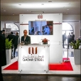 Exhibition stand of "Qatar Steel" company, conference STEELORBIS FALL 2014 in Berlin